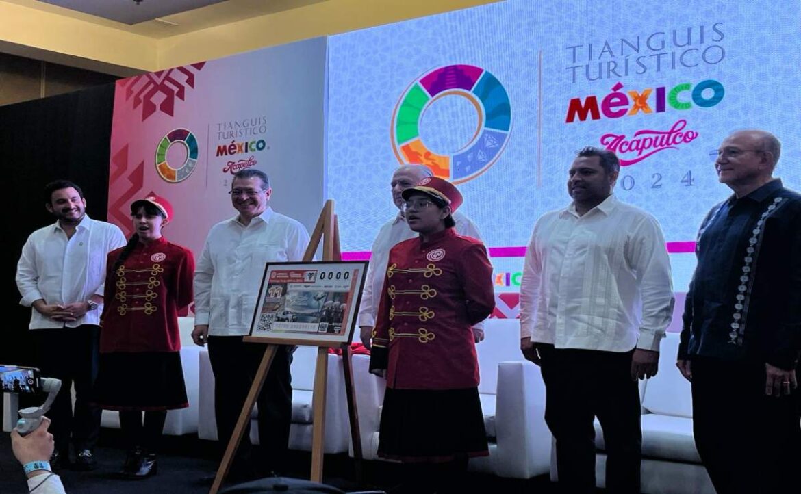 develan-billete-de-la-lotería-nacional-“Acapulco-Renacerá”- En el marco de la 48 Edición del Tianguis Turístico México 2024, se develo el billete de la Lotería Nacional "Acapulco Renacerá".